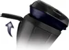 Close-up view of a black electric shaver head being opened. Voir les images du produit