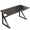 A black gaming desk with a carbon fiber pattern on a white background. Produktbild-Vorschau