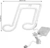 A white neon music note light with a battery pack and USB cable. Produktbild-Vorschau