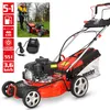 A man is using a red and black lawnmower in a grassy yard. Produktbild-Vorschau