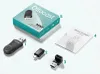 A flat lay of Ottocast Mini wireless car adapter, its packaging, user manual, and accessories against a white background. Produktbild-Vorschau