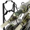 A close-up view of a black metal wine rack holding several bottles of white wine. Náhled obrázku produktu