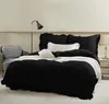 A bedroom scene with a neatly made bed. Produktbild-Vorschau