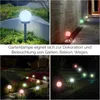 Collage of four images showing LUMILED solar LED globe lights in various outdoor settings at night and during the day. Produktbild-Vorschau