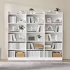 A white, multi-shelf bookcase filled with books and decorative items. Produktbild-Vorschau