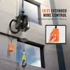 A heavy-duty electric hoist is shown mounted on a building exterior, with a remote control in use. Anteprima dell’immagine prodotto
