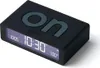 A black digital alarm clock with a digital display. Produktbild-Vorschau