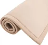 A rolled-up beige mat is shown against a white background. Produktbild-Vorschau