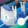 A product shot of dehumidifier bags with hangers and clothespins on a clothesline. Produktbild-Vorschau