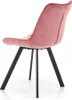 A side view of a pink velvet chair with black legs against a white background. Náhled obrázku produktu