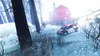 A rally car driving on a snowy road in front of a red barn with a Swedish flag. Produktbild-Vorschau
