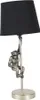 A table lamp with a monkey figure climbing a pole. Produktbild-Vorschau