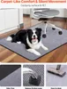 A dog lying on a gray chair mat under an office chair, with close-up shots of the mat's texture and a vacuum cleaner. Produktbild-Vorschau