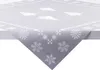 A close-up view of a grey tablecloth with a white snowflake and Christmas tree pattern, draped over the corner of a white table. Produktbild-Vorschau
