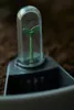 A close-up of a plant watering indicator inserted into soil. Produktbild-Vorschau