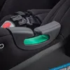 A close-up view of a black baby car seat with a green release lever. Produktbild-Vorschau
