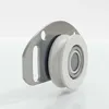 A close-up, 3D rendering of a roller bearing with a metal mounting plate. Produktbild-Vorschau