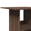 A close-up view of a wooden bar table with shelves. Voir les images du produit