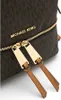 Close-up of a brown Michael Kors backpack with gold zippers and leather zipper pulls. Anteprima dell’immagine prodotto