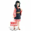 A figurine of a character from Demon Slayer: Kimetsu No Yaiba, standing against a white background. Podgląd zdjęcia produktu