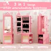 Three pink children's furniture pieces are displayed against a light pink and white patterned background. The pieces appear to be a full-length mirror, a jewelry cabinet, and a clothing rack. Podgląd zdjęcia produktu