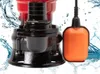 A close-up of a submersible pump with a float switch, surrounded by water splashes. Anteprima dell’immagine prodotto