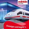 A modern train at a station at dusk. Produktbild-Vorschau