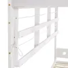 A close-up view of the white wooden frame of a bunk bed, showing the safety rails and how they are attached with white rope. Produktbild-Vorschau