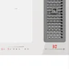 A close-up view of a modern white induction cooktop with a built-in gray ventilation grille. Produktbild-Vorschau