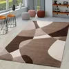 A living room scene with a rug, side tables, and poufs. Produktbild-Vorschau