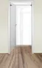 An open white door with a silver handle, leading into a brightly lit room with a wooden floor. Produktbild-Vorschau