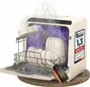 A compact dishwasher with its door open, showing dishes inside and steam rising. Produktbild-Vorschau