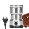 A coffee grinder with a plug and a pile of ground coffee with coffee beans. Podgląd zdjęcia produktu