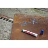 A marker pen and its cap on a rusty metal surface with chalk markings. Produktbild-Vorschau