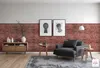 A living room scene with a sofa, armchair, side tables, and a credenza against a brick wall. Produktbild-Vorschau