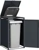 A dark gray trash bin enclosure with a light gray trash bin inside. The lid of the enclosure and the lid of the trash bin are open. Produktbild-Vorschau