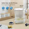A water filter pitcher is shown on a kitchen counter with some fruit and storage containers. Náhled obrázku produktu