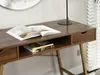 Close-up view of a desk with an open book and books stacked on a shelf. Voir les images du produit