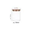 A clear shot of a glass storage jar with a bamboo lid, with dimensions and volume indicated by text overlays. Produktbild-Vorschau