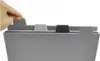 A hand is shown placing a tab on a set of cutting boards. Náhľad obrázku produktu