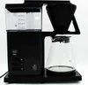 A black Melitta coffee maker with a glass carafe on a white background. Produktbild-Vorschau