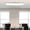 An office environment with desks, computers, and large windows. Produktbild-Vorschau