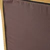 A close-up view of the textured fabric of a floor chair, showing the stitching and a zipper. Náhled obrázku produktu