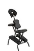 A black massage chair photographed in a studio setting. Produktbild-Vorschau