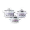Three white enamel pots with floral decorations, arranged in a group. Produktbild-Vorschau
