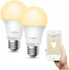 Two smart LED light bulbs and a smartphone displaying a smart home app. Podgląd zdjęcia produktu