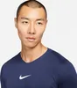 Close-up shot of a man wearing a dark blue Nike shirt. Produktbild-Vorschau