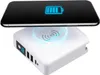A smartphone is wirelessly charging on a white power bank. Podgląd zdjęcia produktu