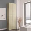 A tall, light wood grain cabinet with four doors is shown in an office setting next to a whiteboard and a large window. Produktbild-Vorschau