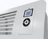 Close-up of the control panel and front grille of a white electric heater. Produktbild-Vorschau